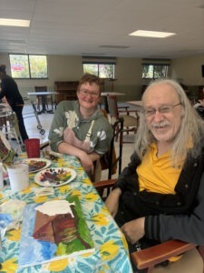 Lifesong resident painting with his family